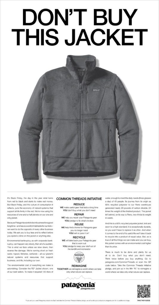 Patagonia advertisement showing a grey jacket and in large black text, the words: Don't buy this jacket. Below, there is smaller text which describes the many ways in which the jacket is not environmentally friendly and sustainable.