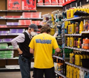 hassett hardware staff member helping a customer in store